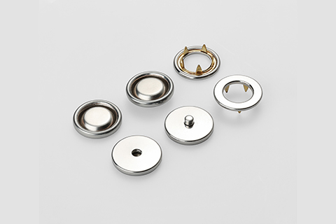 童装金属纽扣在设计生产时有哪些特点？