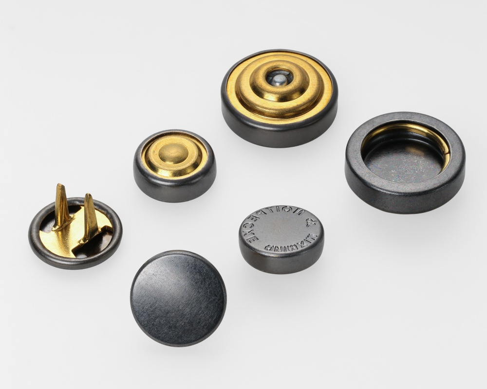 童车工厂如何验证金属纽扣定制的样品效果？