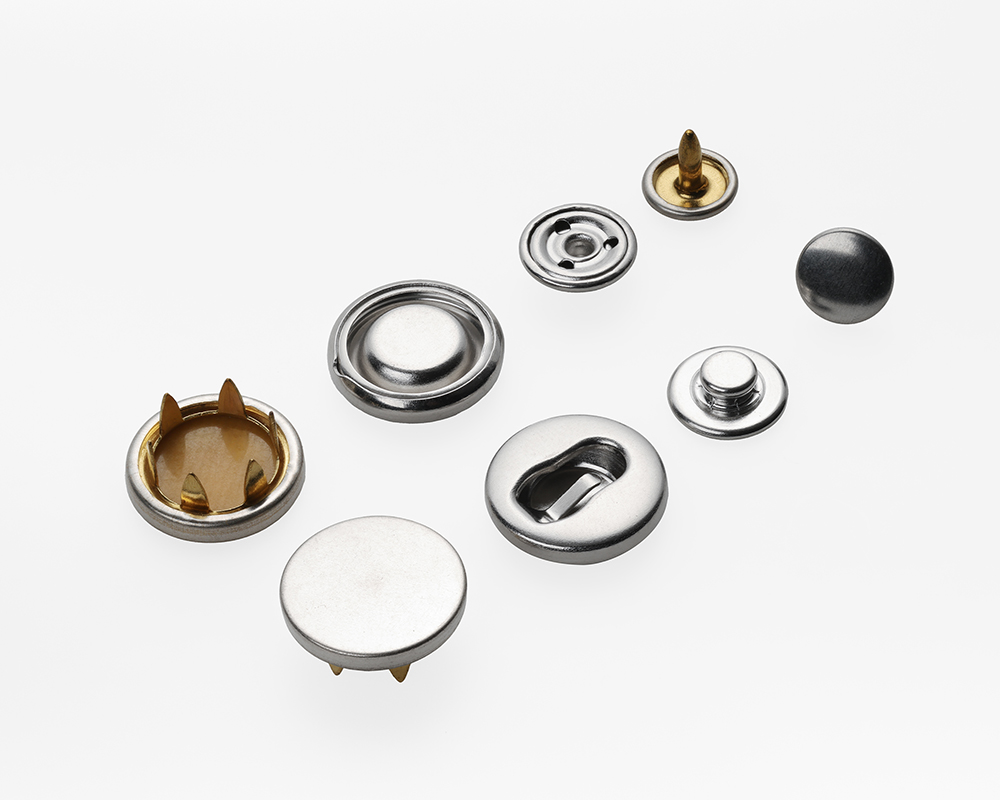 高端童装的金属纽扣是如何做到防脱落的？