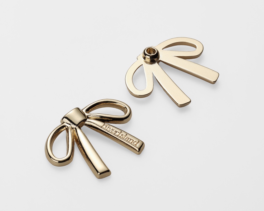 箱包厂家如何为箱包选择耐磨金属钮扣材质？（第881篇）